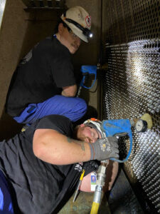 Strategies for Minimizing Downtime in Condenser Retubing: Keeping Your Critical Path on Schedule 2 Merrick Group technician following strict safety guidelines for nuclear facilities